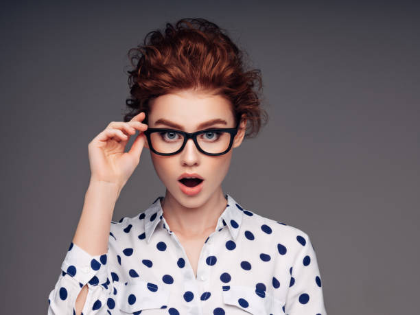 istock Beautiful girl with eyeglasses 1189884640