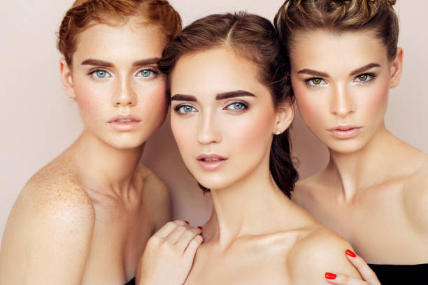 istock Three beautiful girls with a natural make-up 1189886420