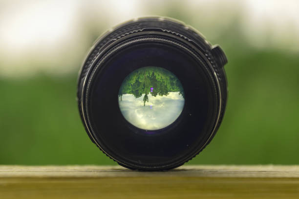 istock photo lens on bokeh green background 1189890963