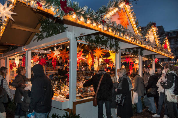 Christmas market in Germany Horizontal shot of one of the stalls of the University Christmas market, Heidelberg heidelberg germany stock pictures, royalty-free photos & images