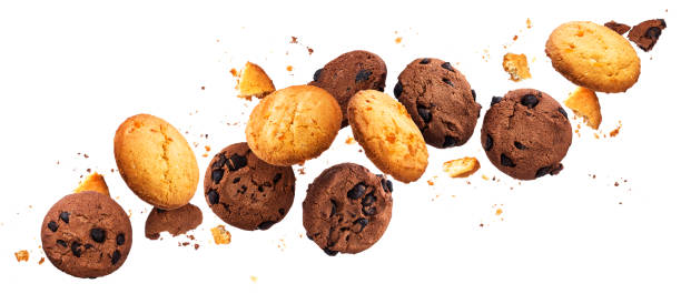 istock Falling broken chip cookies isolated on white background with clipping path, flying biscuits 1189892376