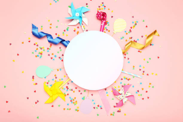 istock Colorful flat lay composition with various party items on pink background 1189892386