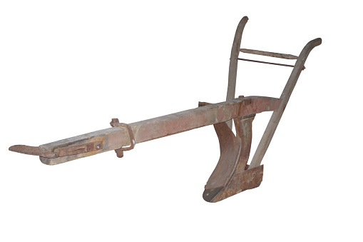 Image of wooden plow for plowing in harness isolated on white
