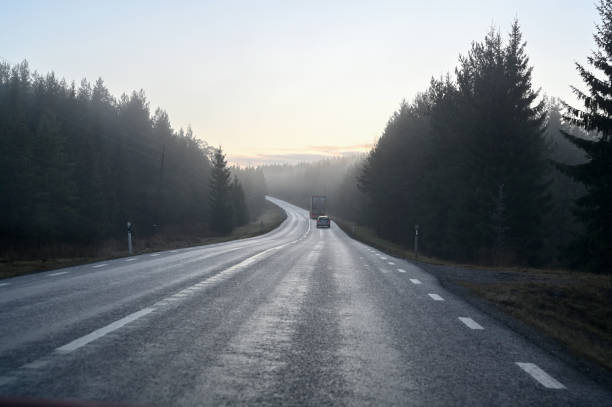 istock slippery morning road with poor wiew in november 1189900000