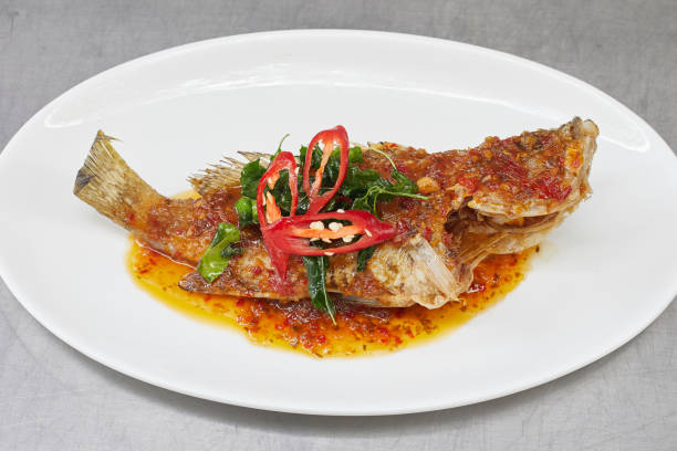 Fried fish toppted with chilli sauce, Thai cuisine