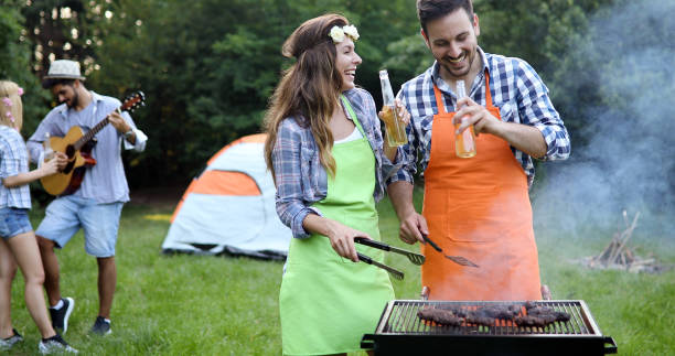 istock Friends spending time in nature and having barbecue 1189904984