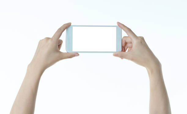 istock Woman hands holding smart phone taking photo 1189906936