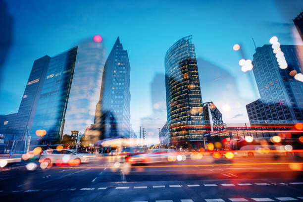 abstract potsdamer platz at dusk, berlin, germany - berlin germany imagens e fotografias de stock