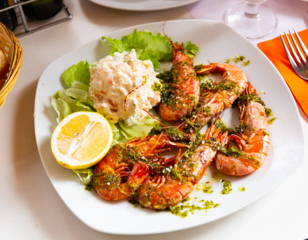 istock Shrimps with heese salad 1189918423