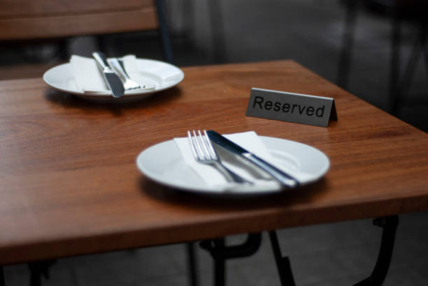 istock The served and reserved for two person table 1189920313