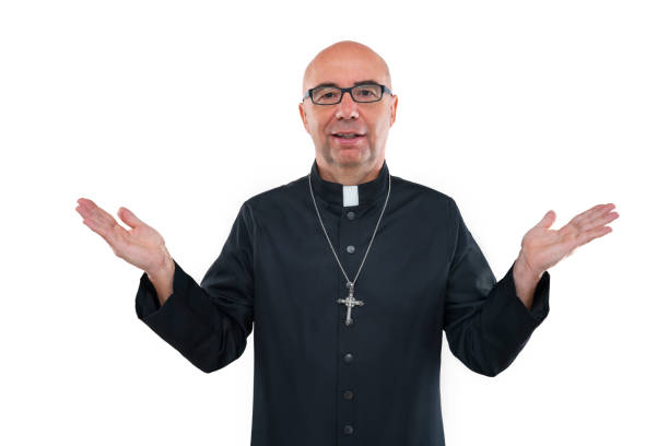 Priest blessing praying god open hands with cassock isolated on white