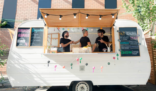 istock Happy entrepreneurs in the food truck 1189924607