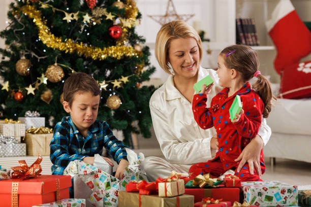 istock Family opening Christmas presents 1189924657
