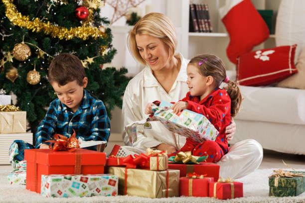 istock Family opening Christmas presents 1189924736