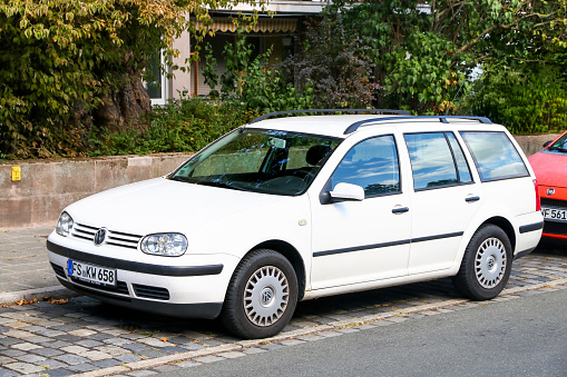 Nuremberg, Germany - September 19, 2019: White estate car Volkswagen Golf in the city street.