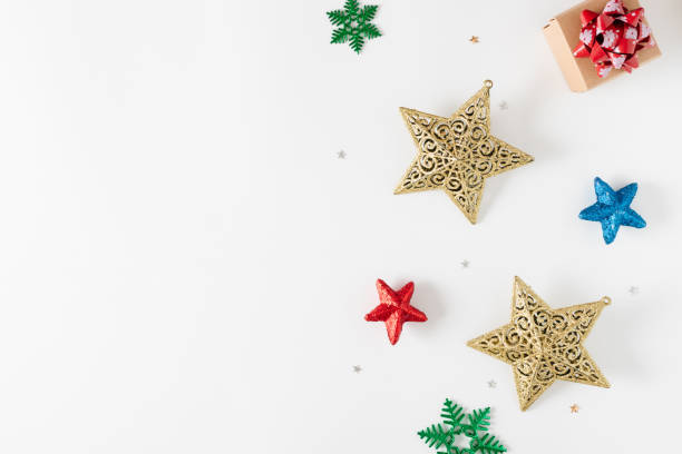 istock Top view of Christmas decorations and gift boxes on white background. 1189925562