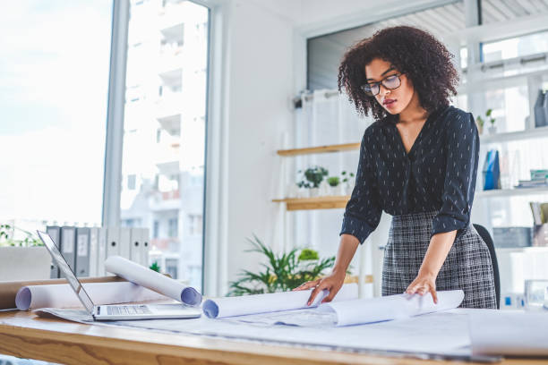 istock Ensuring her plans are good to go 1189926347