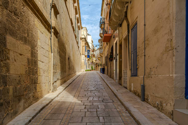 istock Shady medieval street in Birgu, Malta 1189928857