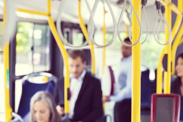 istock Gray handles and yellow poles in bus 1189929130