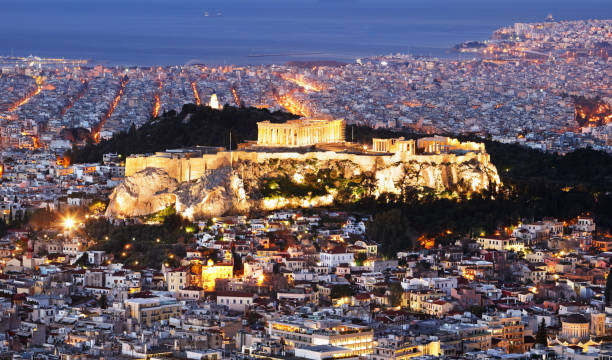 istock Greece - Athens skyline at night with acropolis 1189929469