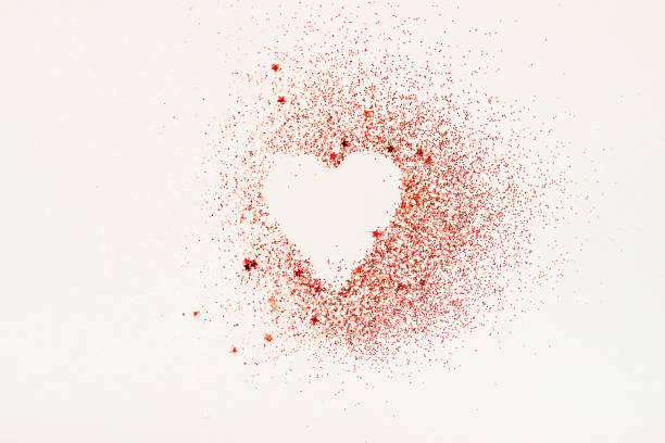 istock Red glitter heart on a white background 1189930312
