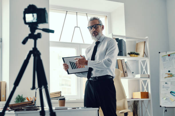 istock Confident mature man in elegant shirt 1189931958