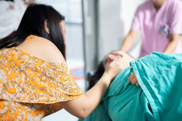 istock After operation, Patient and her family 1189935471