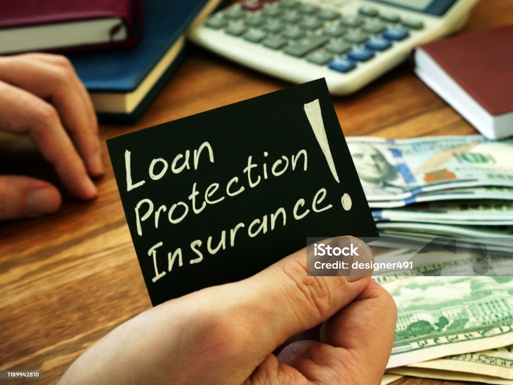 Loan Protection Insurance Sign On The Black Sheet Stock Photo