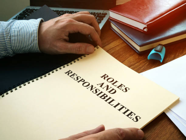 istock Roles And Responsibilities book on the desk. 1189942834
