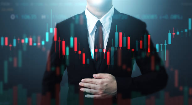 istock Double exposure businessman and candle line graph. Technical price candlestick chart graph and indicator stock online trading 1189943234