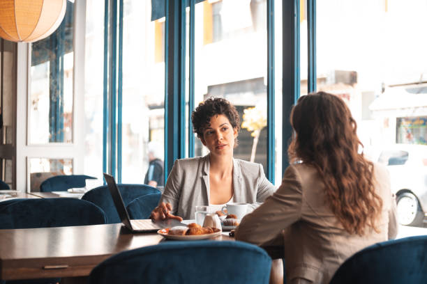 Business meeting at cafe