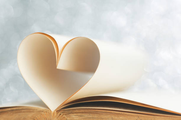istock Book with pages shape of heart 1189944821
