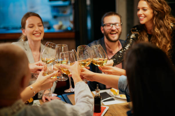 istock Friends toasting with wine in reataurant. 1189946247