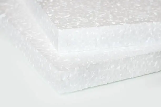 Photo of Styrofoam sheet on a white background. polystyrene