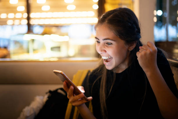 istock Young woman using smart phone 1189950032