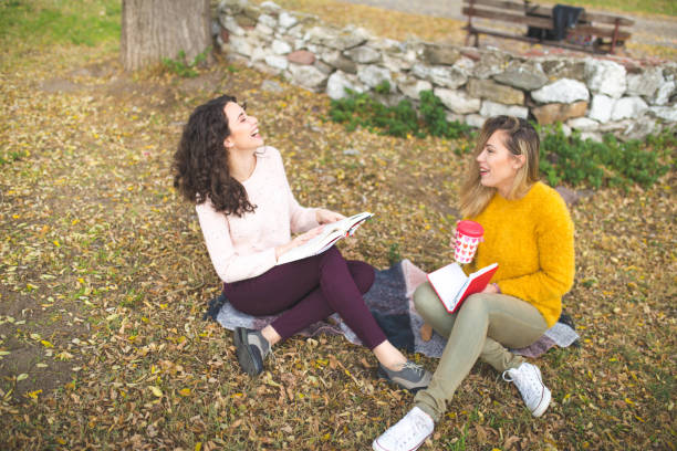 istock Two young women enjoying an autumn day 1189956023