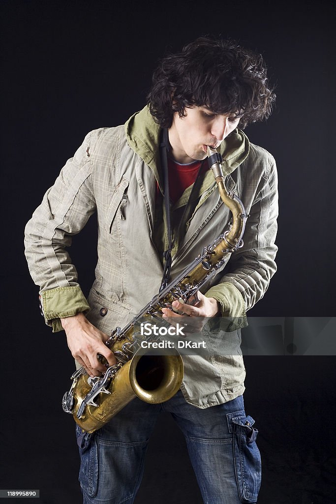 jazz saxophone player on a black background  Saxophonist Stock Photo