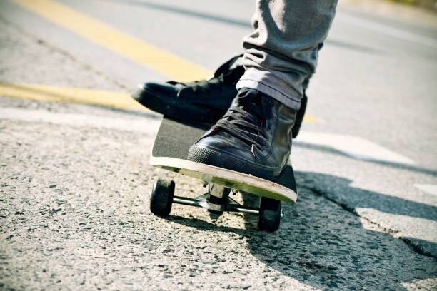 istock young man skateboarding, filtered 1189959803