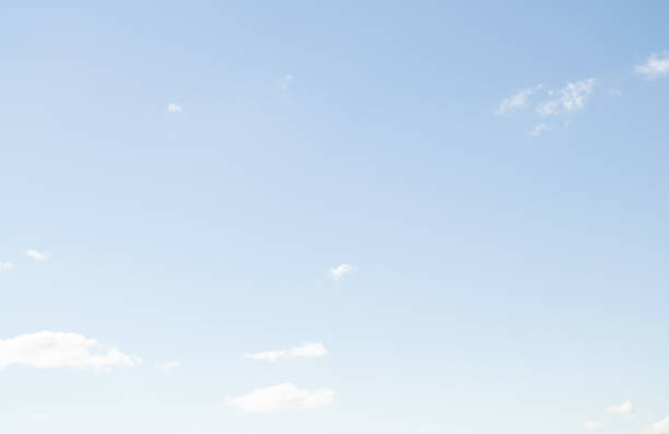 istock Beautiful blue sky with few clouds on bright  sunny day 1189961451