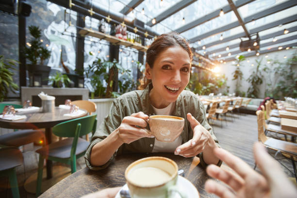 istock Women Chattering Actively over Coffee 1189962956