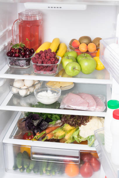 istock open fridge with vegetables and fruits, front view 1189963553