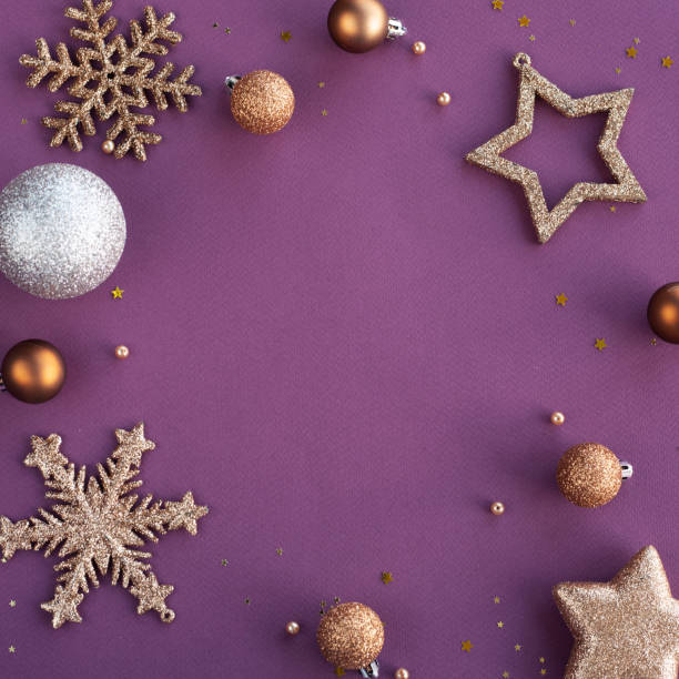 istock Christmas frame of golden ornaments 1189966608