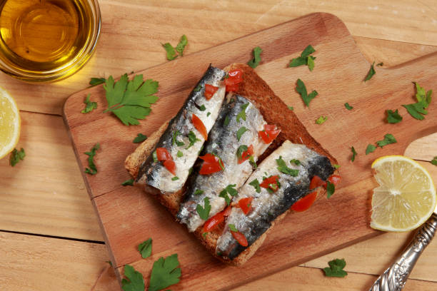 Sardines with Olive Oil as an Appetizer on toasted bread