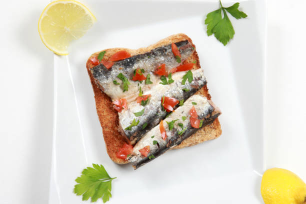 istock Sardines with Olive Oil as an Appetizer on toasted bread 1189969609
