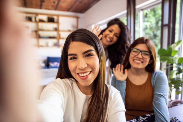 istock Latin women at home, relaxing and taking a break from studying 1189969789