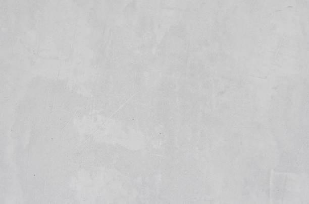 istock gray concrete background texture clean stucco fine grain cement wall clear and smooth white polished grunge interior indoor. 1189971815