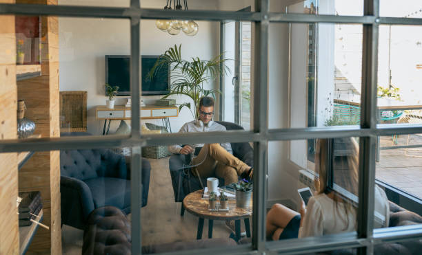 istock Businessman sitting in waiting room 1189971896