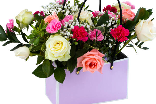 istock Gift box with beautiful flowers isolated on white background 1189974352