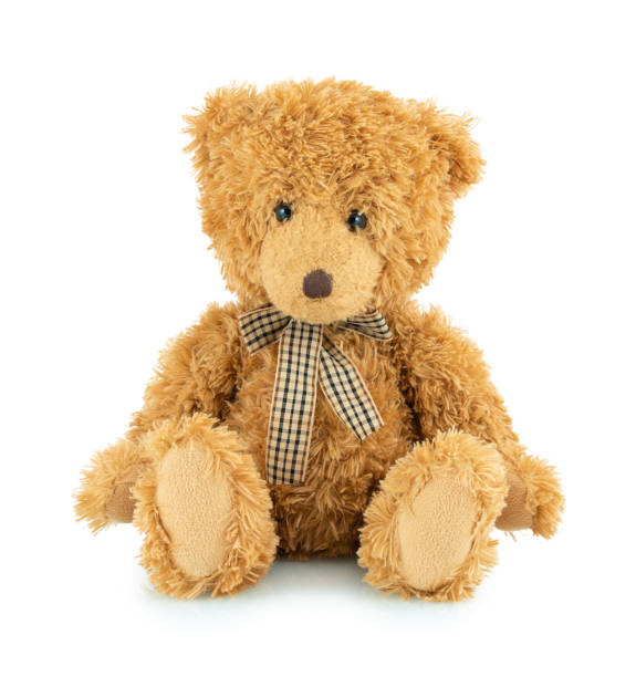 istock Bear plushie doll isolated on white background with shadow reflection. Plush stuffed puppet on white backdrop. Light brown fluffy toy for children. Cute furry animal plaything. 1189975093