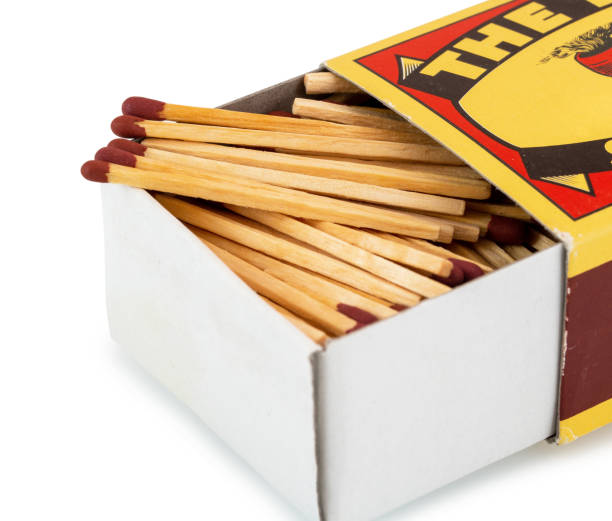 istock Vintage cardboard matchbox with matches isolated on white background with clipping path. Matches in open match-box on white underlay - retro style. 1189975179